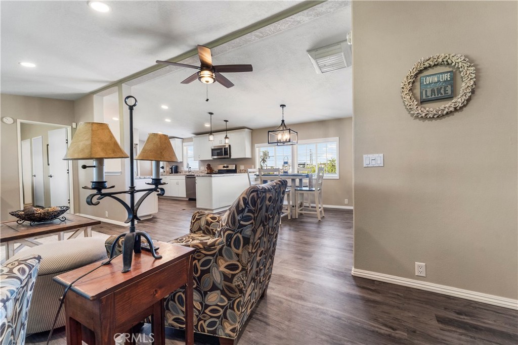 48197 Valley Center Road Newberry Springs, CA 92365 - Photo 12 of 30 a dining room with furniture and wooden floor