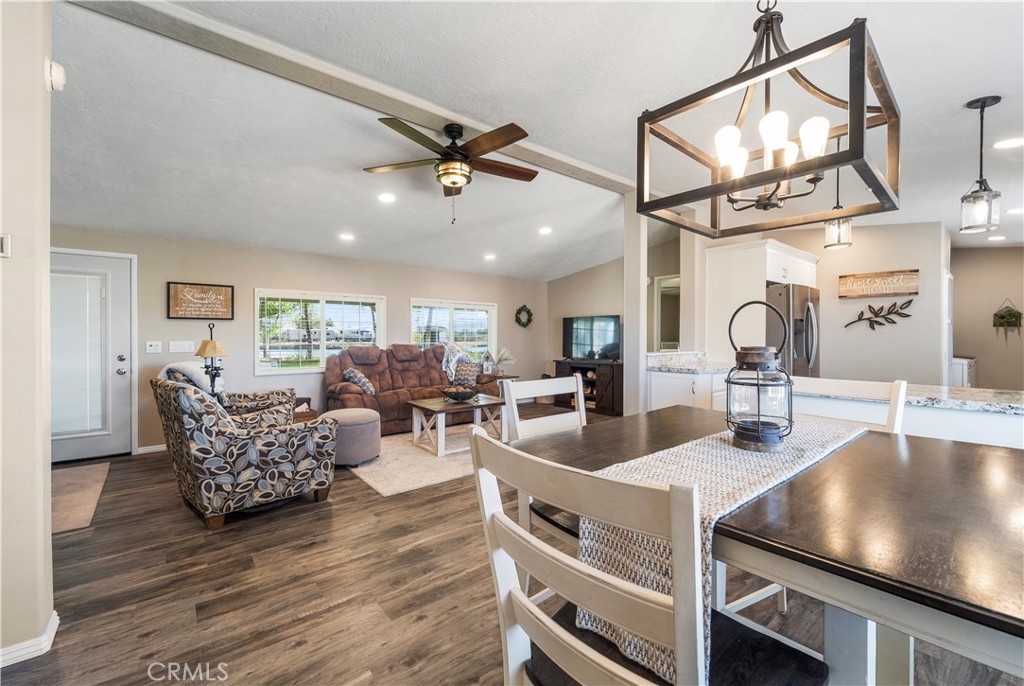 48197 Valley Center Road Newberry Springs, CA 92365 - Photo 8 of 30 a living room with furniture and a wooden floor