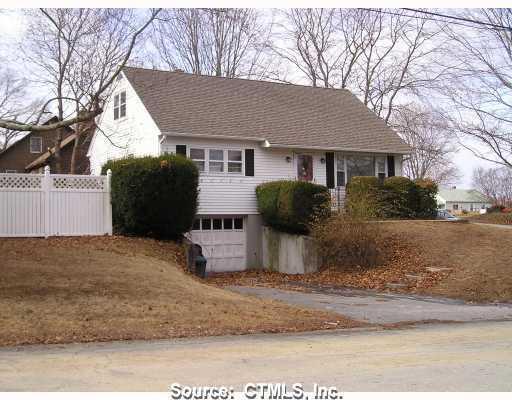 143 Prospect Avenue Killingly, CT 06239 - Photo 1 of 1 a view of a house with a yard covered in snow