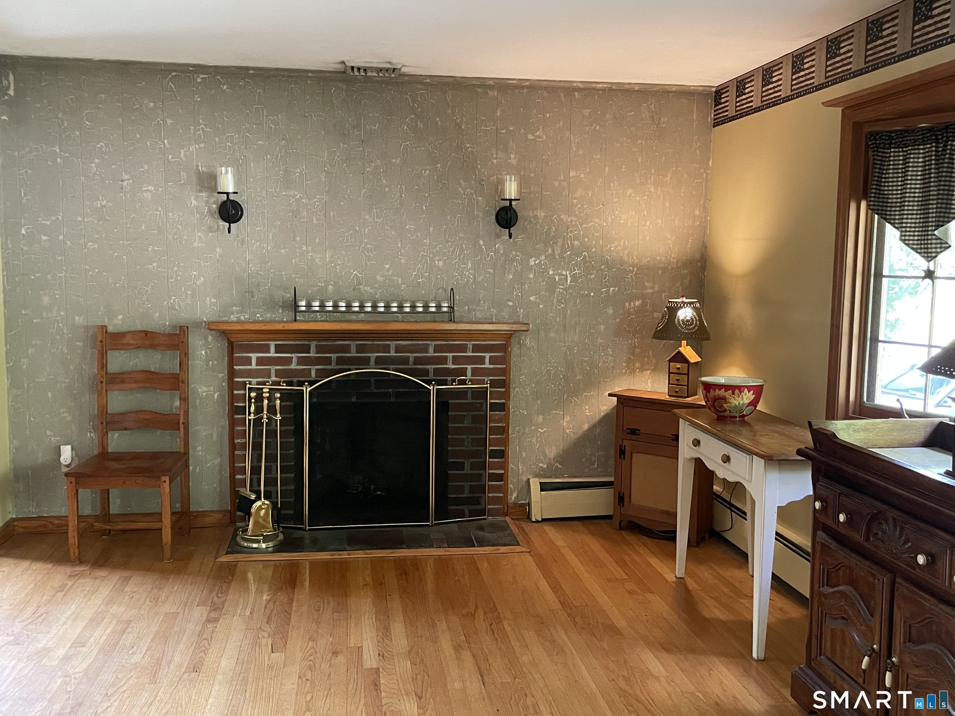 112 Maple Street Seymour, CT 06483 - Photo 3 of 34 Warm, cozy fireplace for those cold wintry nights!