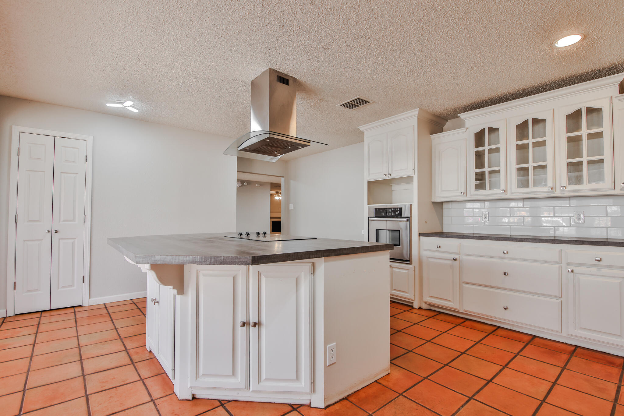 5437 45th Street Lubbock, TX 79414 - Photo 11 of 52 a kitchen with stainless steel appliances a sink and cabinets
