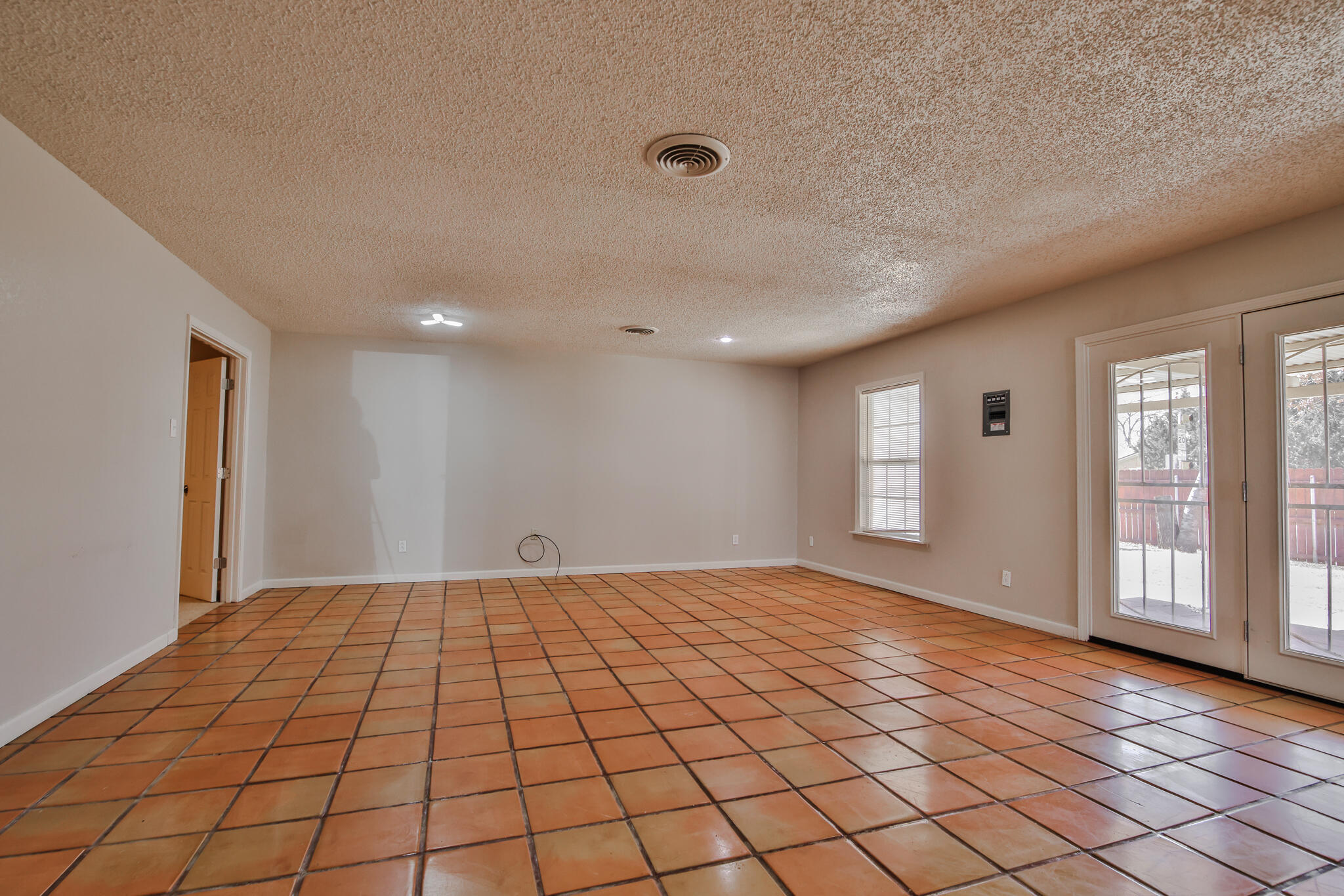 5437 45th Street Lubbock, TX 79414 - Photo 15 of 52 a view of an empty room and window