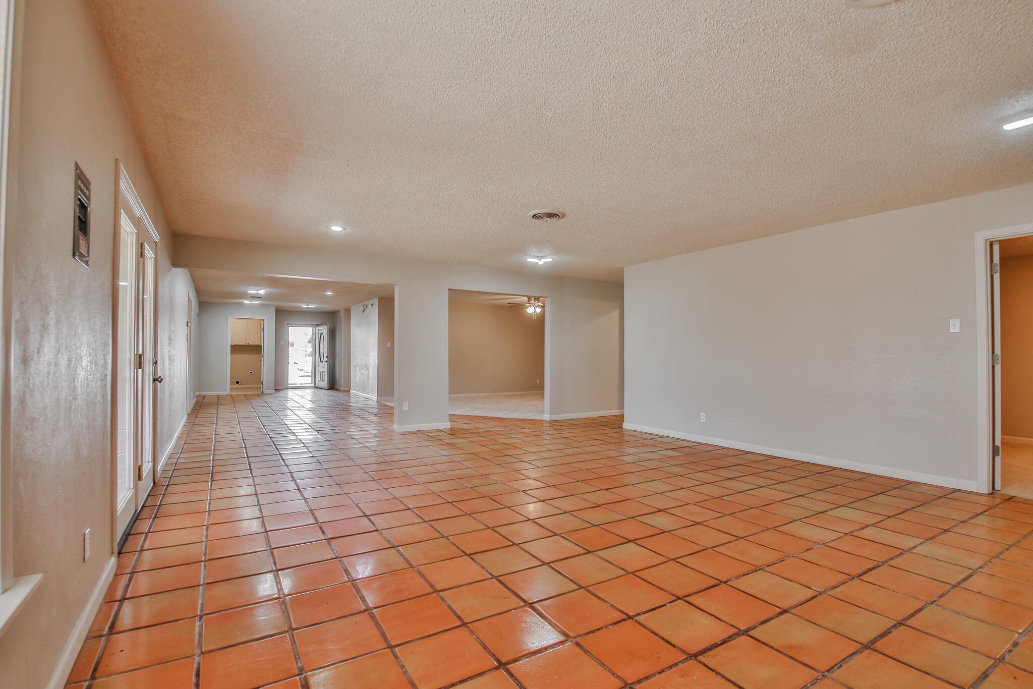 5437 45th Street Lubbock, TX 79414 - Photo 17 of 52 a view of a hallway with wooden floor