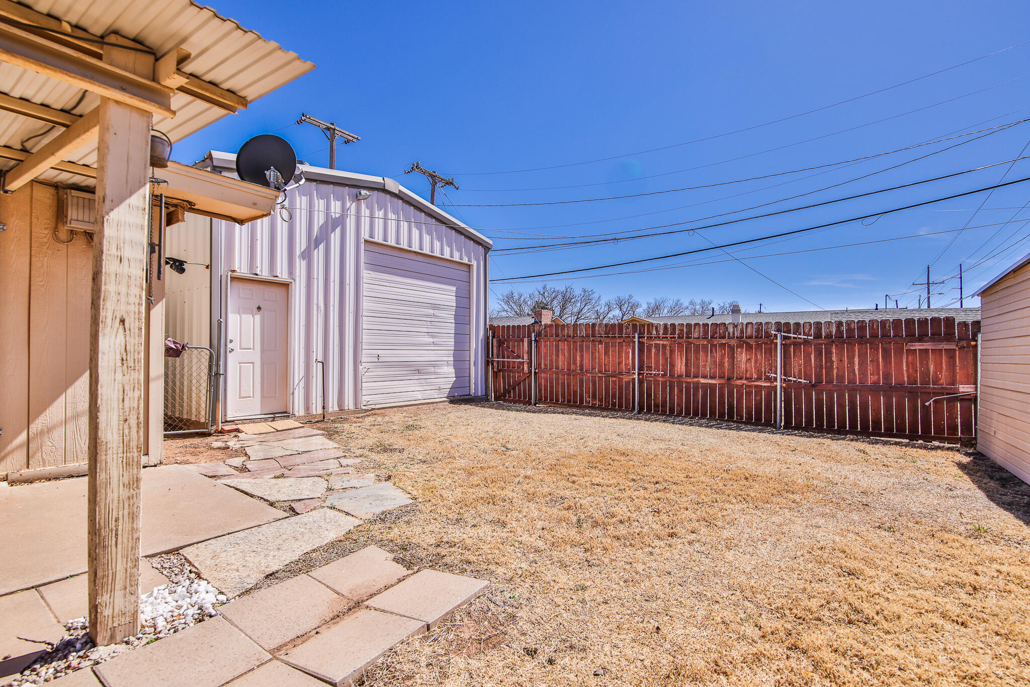 5437 45th Street Lubbock, TX 79414 - Photo 47 of 52 a view of a backyard of a house