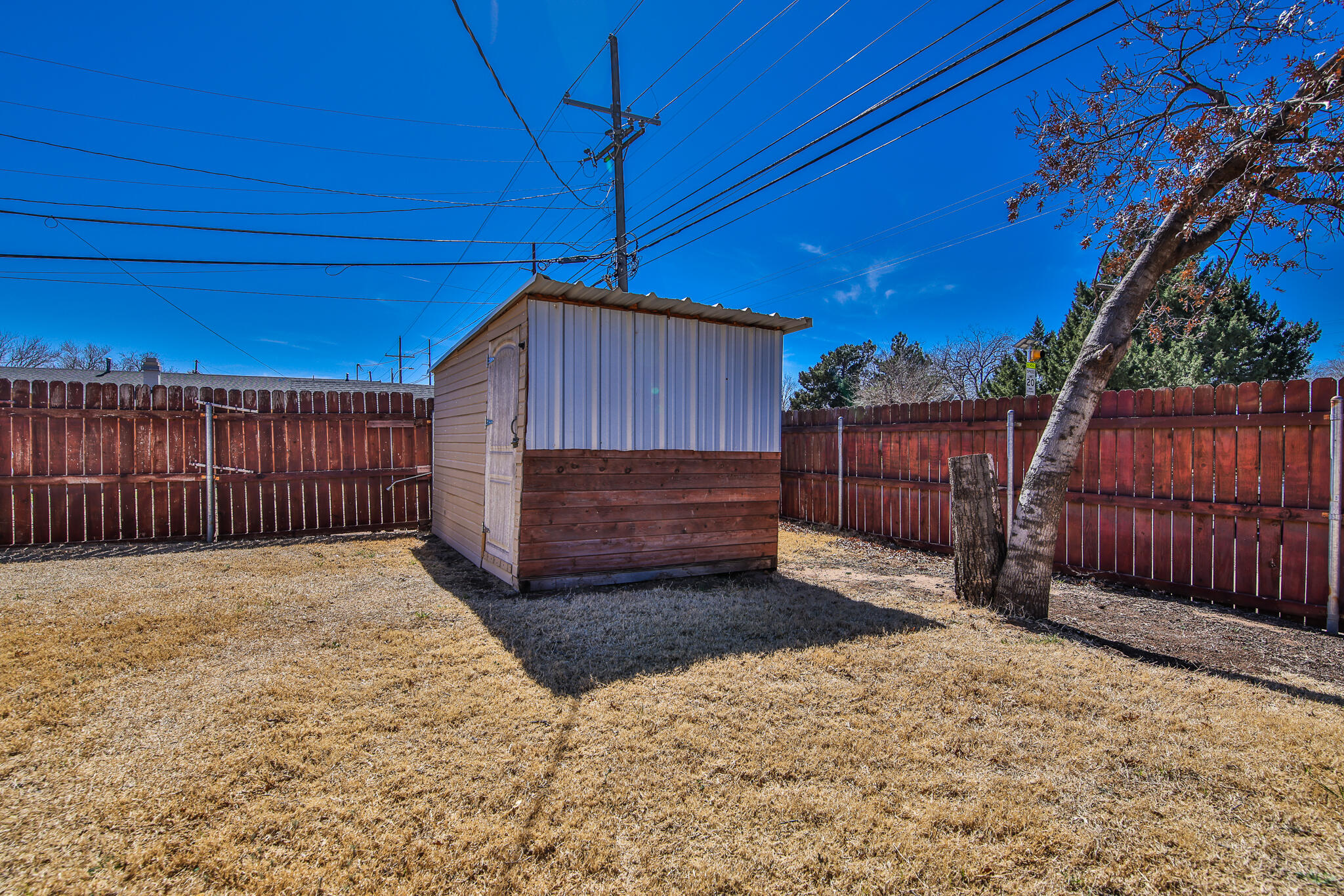 5437 45th Street Lubbock, TX 79414 - Photo 48 of 52 a view of a backyard of a house