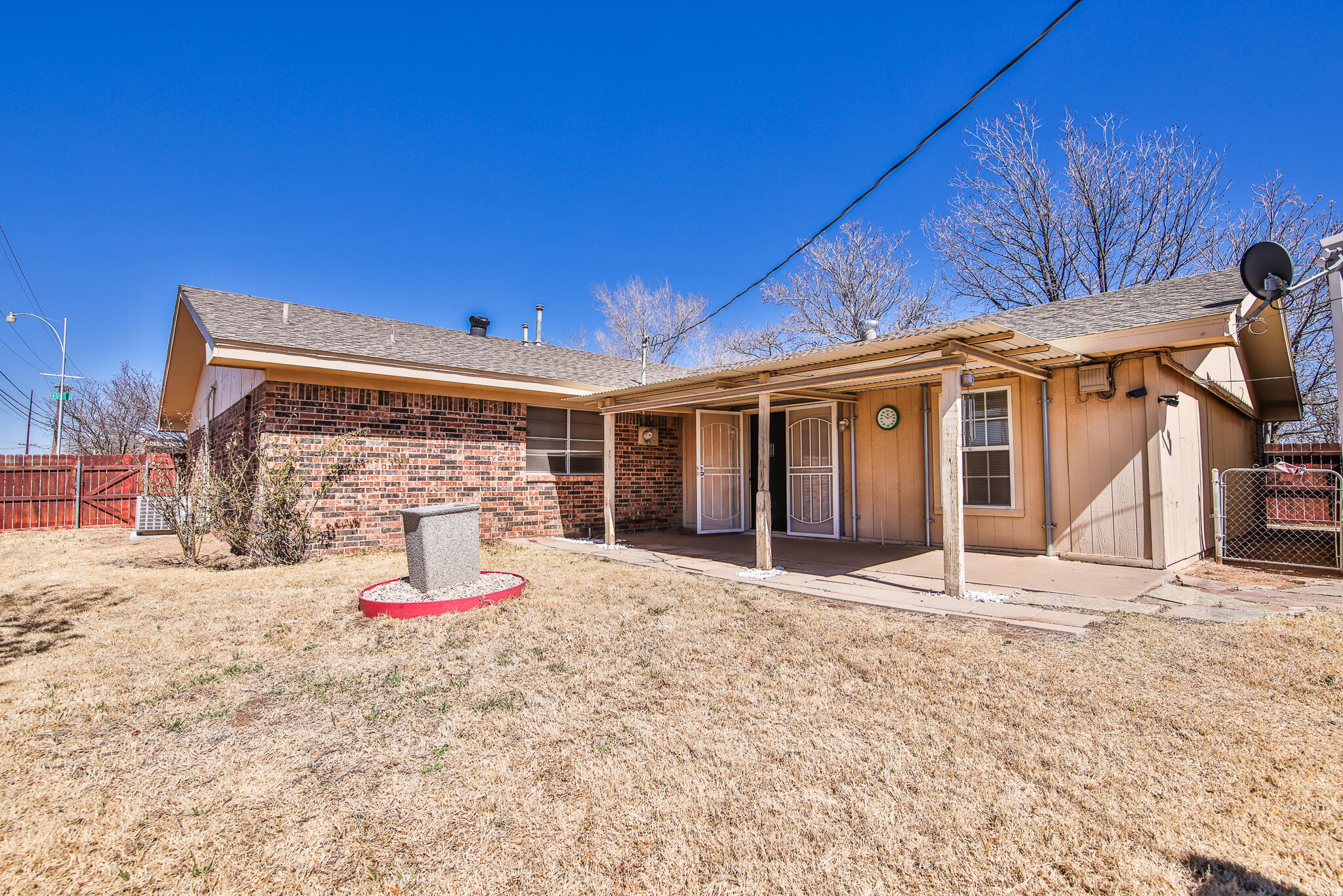 5437 45th Street Lubbock, TX 79414 - Photo 50 of 52 a house with porch in front of it