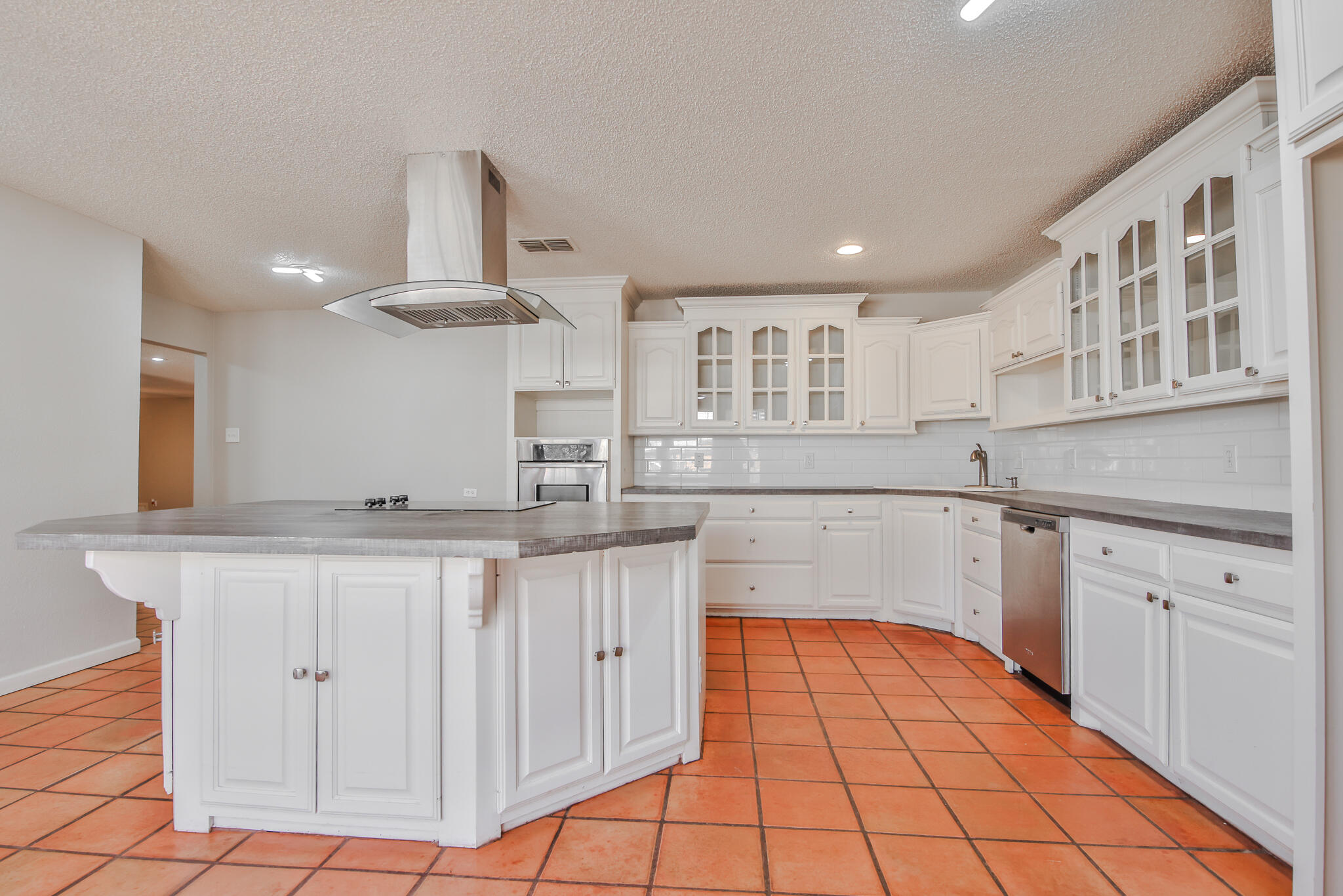 5437 45th Street Lubbock, TX 79414 - Photo 10 of 52 a kitchen with stainless steel appliances granite countertop a sink and cabinets
