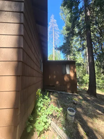 a view of a back yard of the house