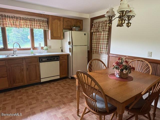 148 Friend Street Adams, MA 01220 - Photo 4 of 28 a kitchen with stainless steel appliances granite countertop a dining table and chairs