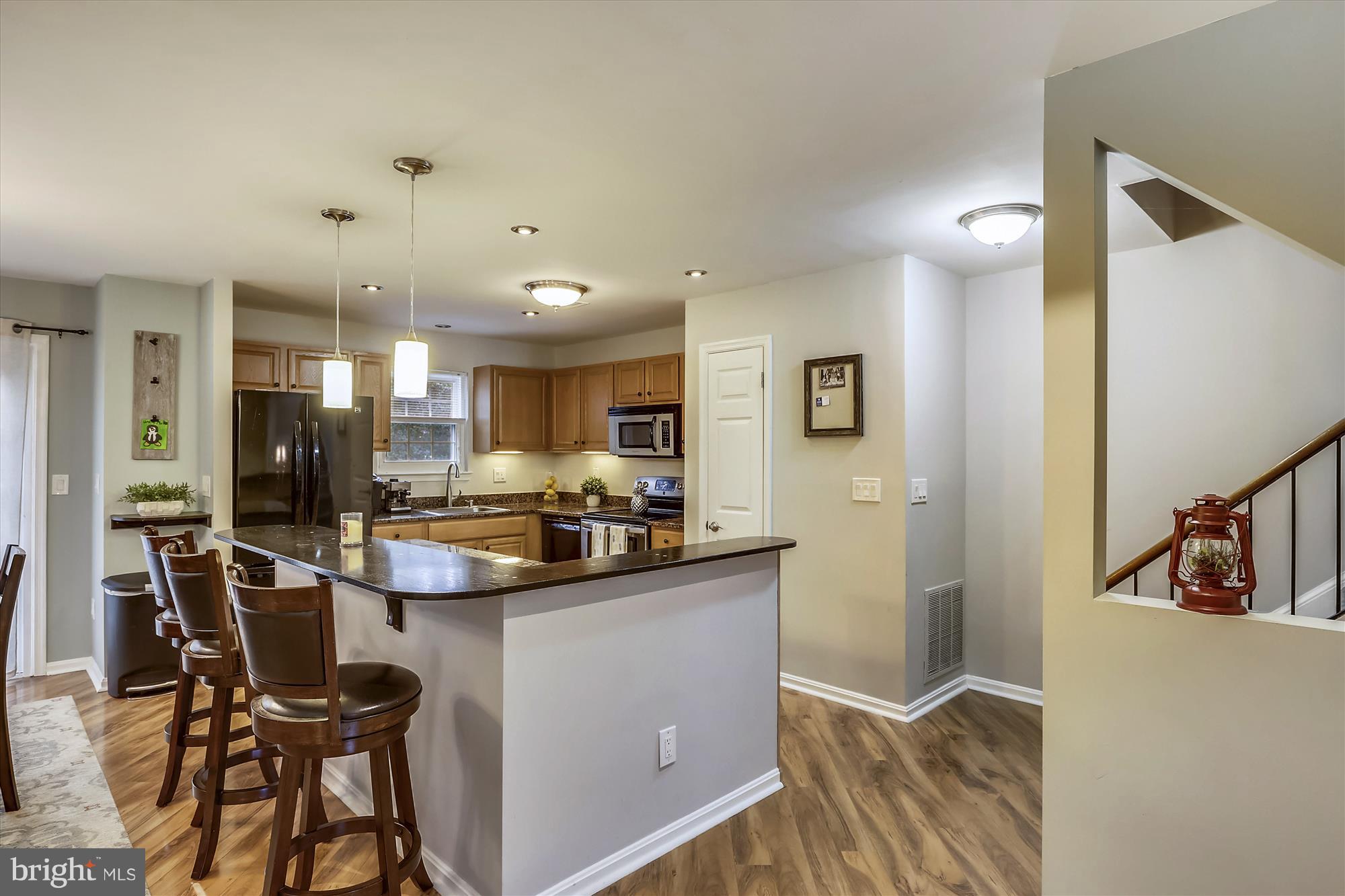 11735 Dry River Court Reston, VA 20191 - Photo 6 of 34 UPDATED KITCHEN W/RECESSED & PENDANT LIGHTING