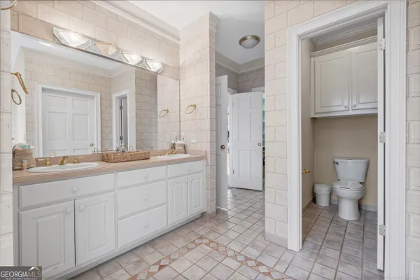 a bed room with a bed and a couch