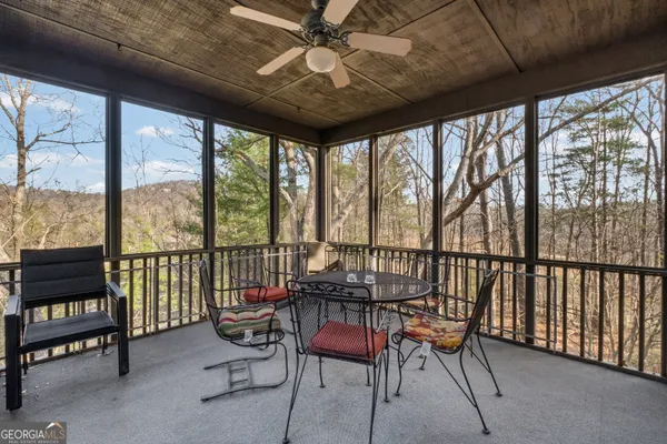 a balcony with wooden floor