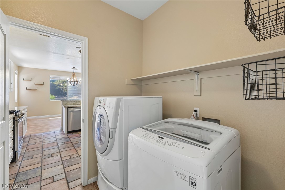 1727 Millstream Way Henderson, NV 89074 - Photo 41 of 46 Functional utility space with appliances and accessible storage solutions.
