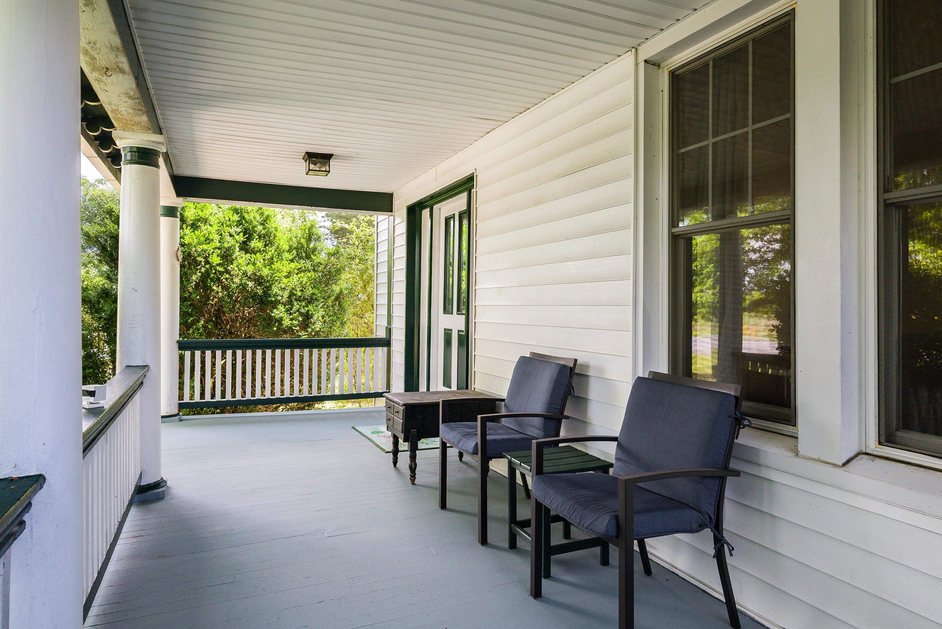 3027 Cross Keys Road Harrisonburg, VA 22801 - Photo 6 of 50 a porch with a table and chairs