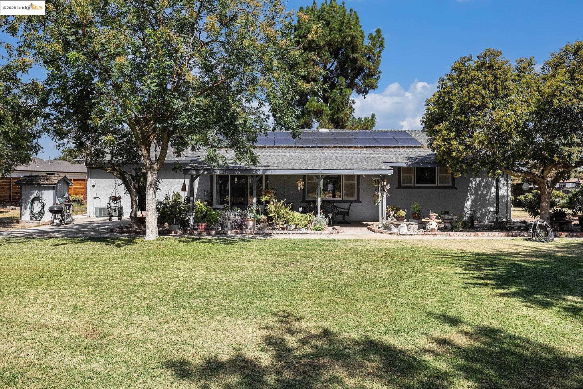 81 Yula Way Oakley, CA 94561 - Photo 14 of 44 a view of a house with swimming pool and sitting area