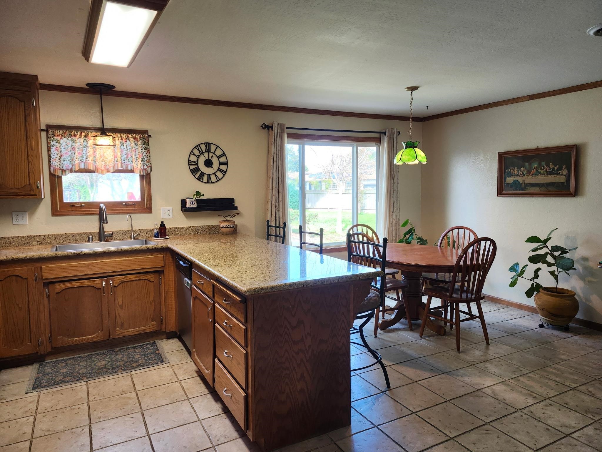 81 Yula Way Oakley, CA 94561 - Photo 33 of 44 a kitchen with a cabinets and chairs