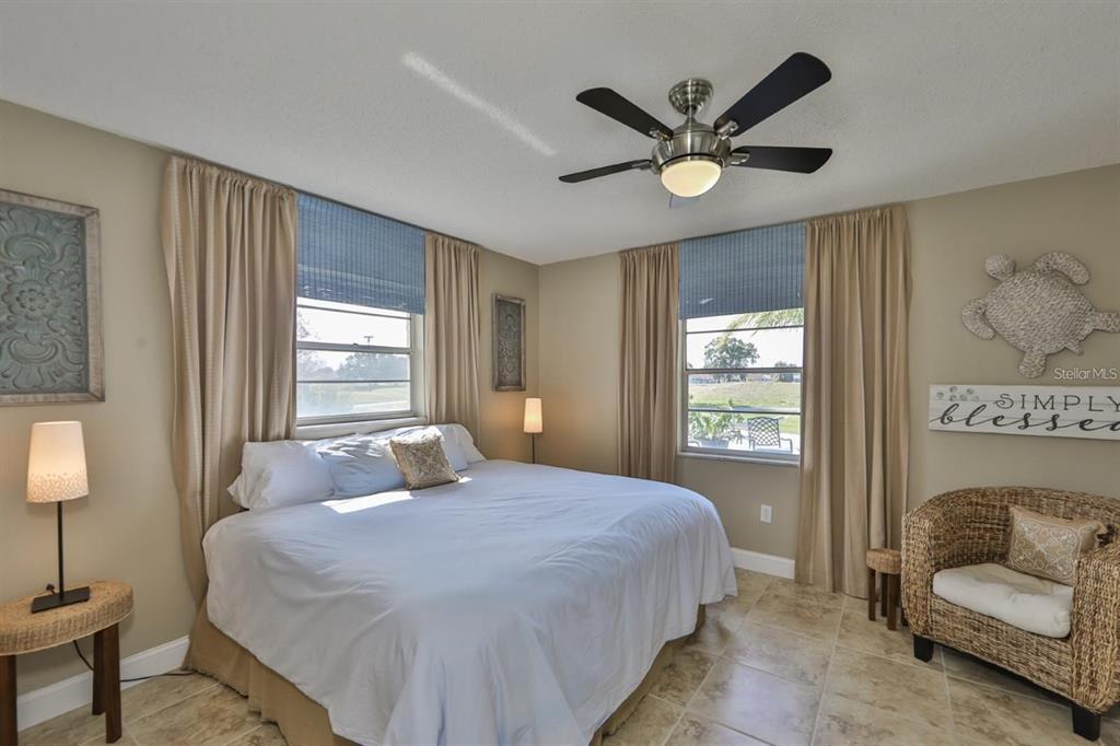 1820 El Rancho Drive Sun City Center, FL 33573 - Photo 28 of 70 a bedroom with a bed and window