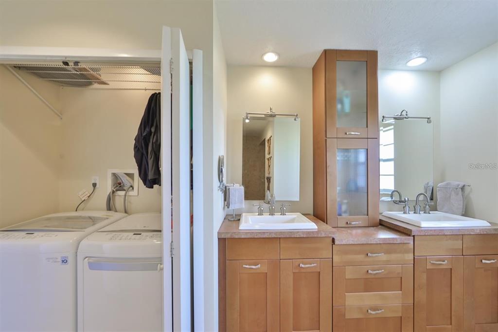 1820 El Rancho Drive Sun City Center, FL 33573 - Photo 29 of 70 a bathroom with a sink and mirror