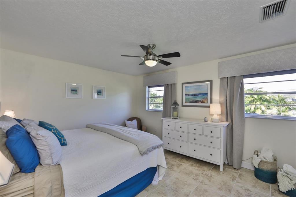 1820 El Rancho Drive Sun City Center, FL 33573 - Photo 31 of 70 a bedroom with a bed and a window