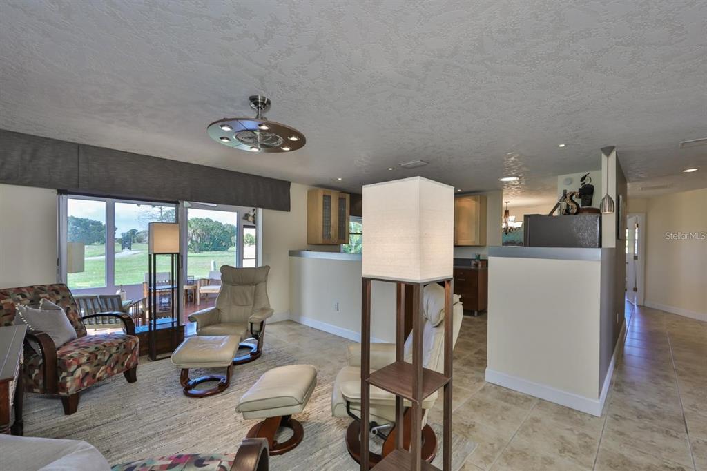 1820 El Rancho Drive Sun City Center, FL 33573 - Photo 42 of 70 a living room with furniture and a table