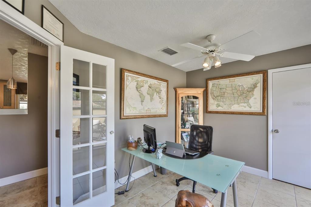 1820 El Rancho Drive Sun City Center, FL 33573 - Photo 45 of 70 a view of a workspace with furniture and a window