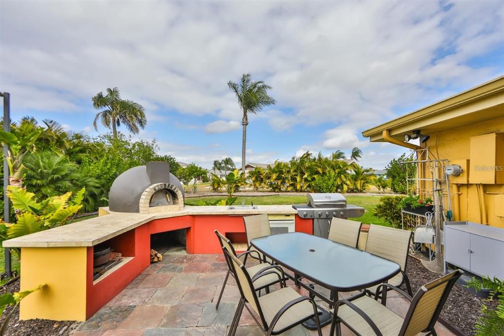 1820 El Rancho Drive Sun City Center, FL 33573 - Photo 52 of 70 a view of an outdoor sitting area with furniture