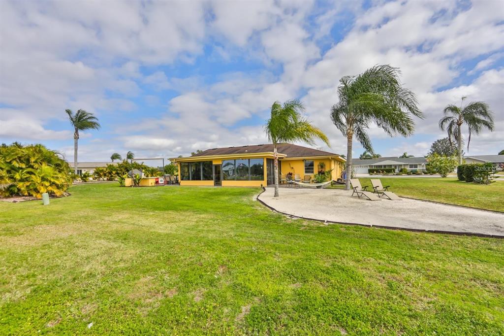 1820 El Rancho Drive Sun City Center, FL 33573 - Photo 57 of 70 a view of outdoor space yard and lake view