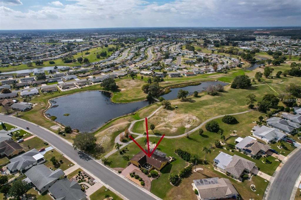 1820 El Rancho Drive Sun City Center, FL 33573 - Photo 67 of 70 an aerial view of residential houses with outdoor space