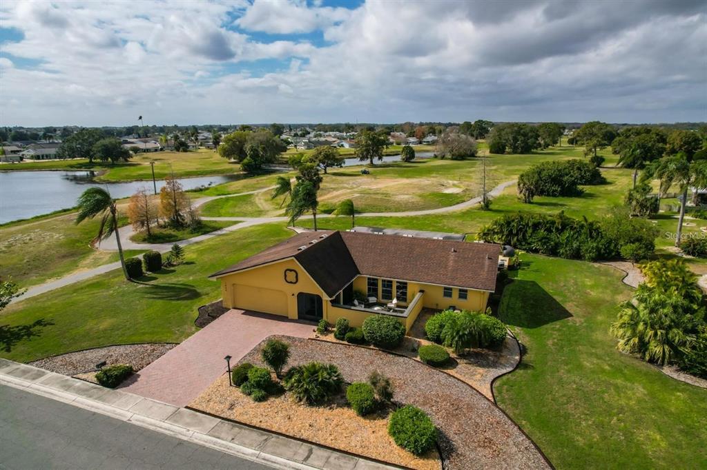 1820 El Rancho Drive Sun City Center, FL 33573 - Photo 69 of 70 an aerial view of a house with a garden