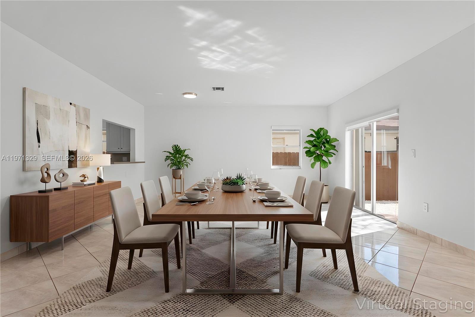 2870 Southwest 21st Street Miami, FL 33145 - Photo 2 of 34 a view of a dining room with furniture