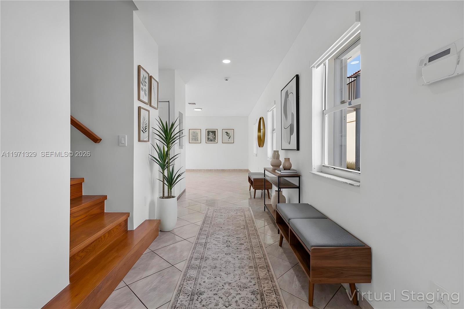 2870 Southwest 21st Street Miami, FL 33145 - Photo 6 of 34 a living room with furniture and a potted plant