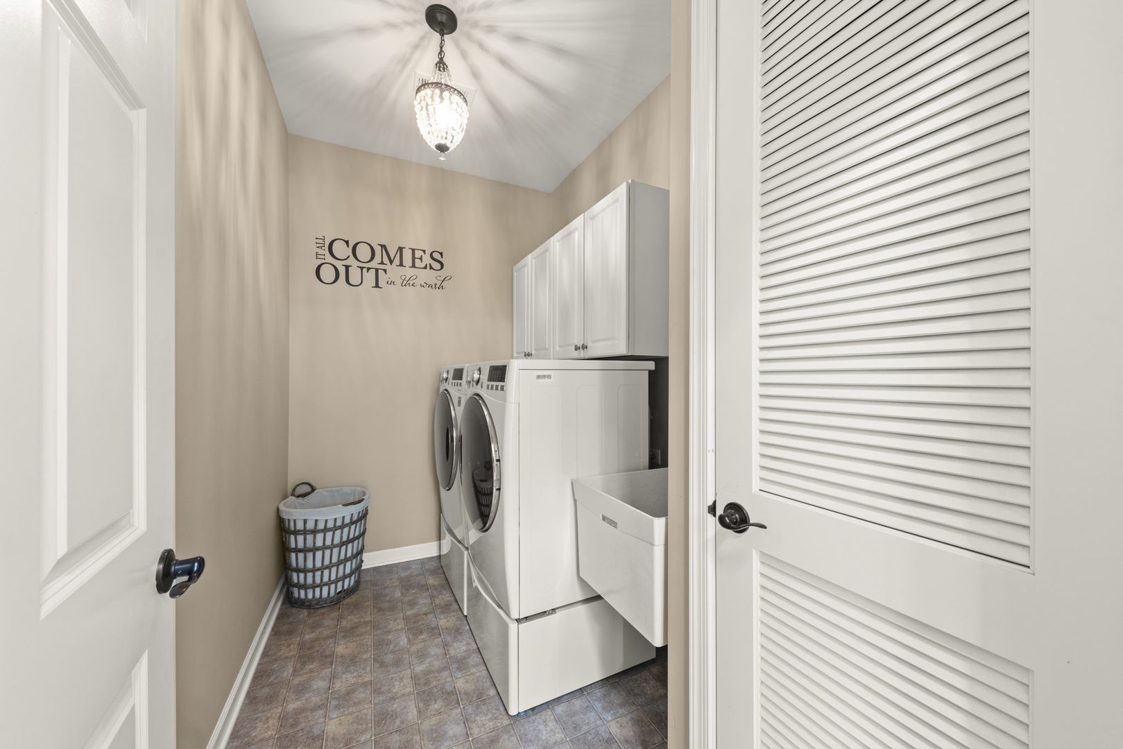 1055 Broadmoor Drive Elgin, IL 60124 - Photo 19 of 41 a view of a storage & utility room with refrigerator and window