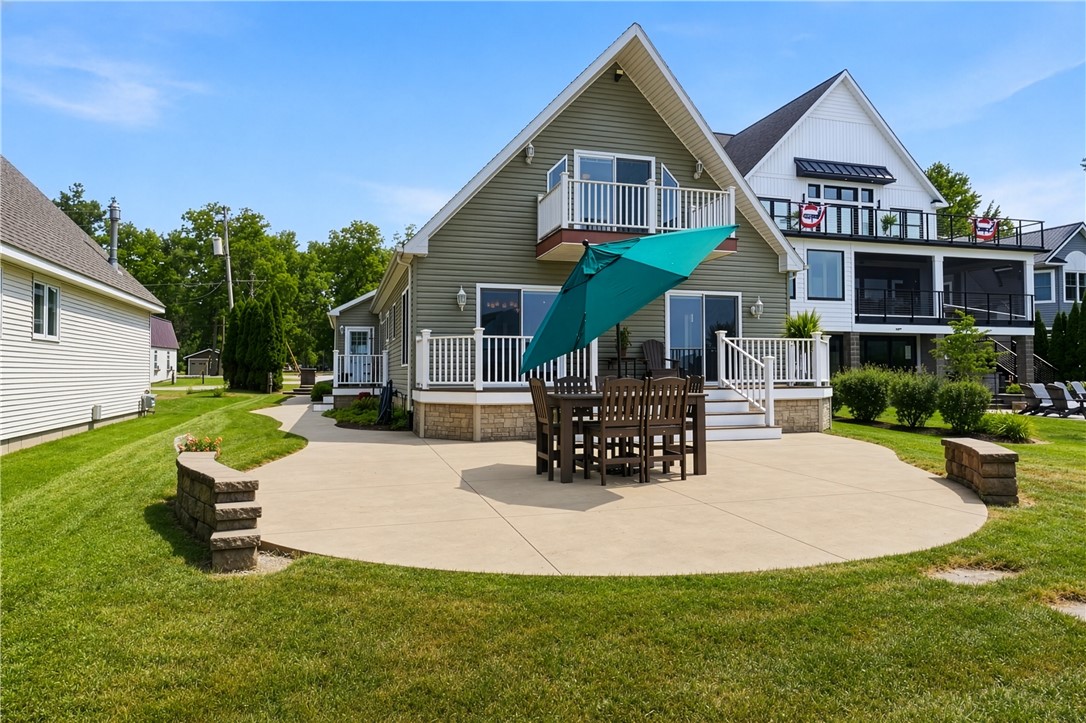 5791 Joy Road Conesus, NY 14435 - Photo 35 of 48 Custom poured aggregate patio ideal for outdoor dining and entertaining.