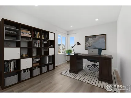 a view of a workspace with furniture