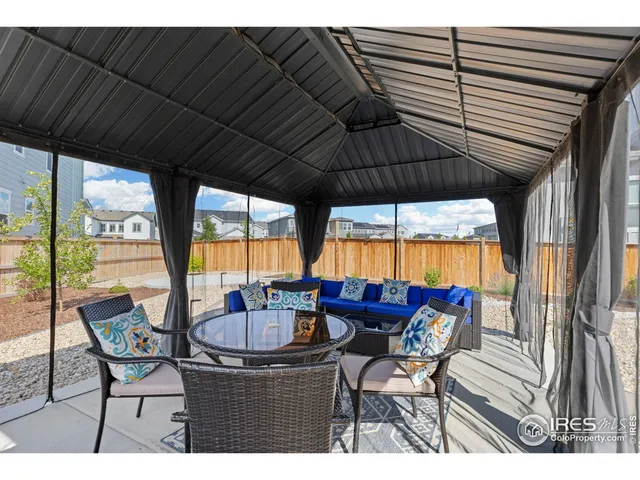 a patio view with patio furniture