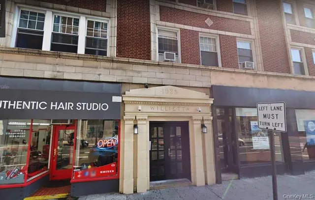 a view of a building with retail shop