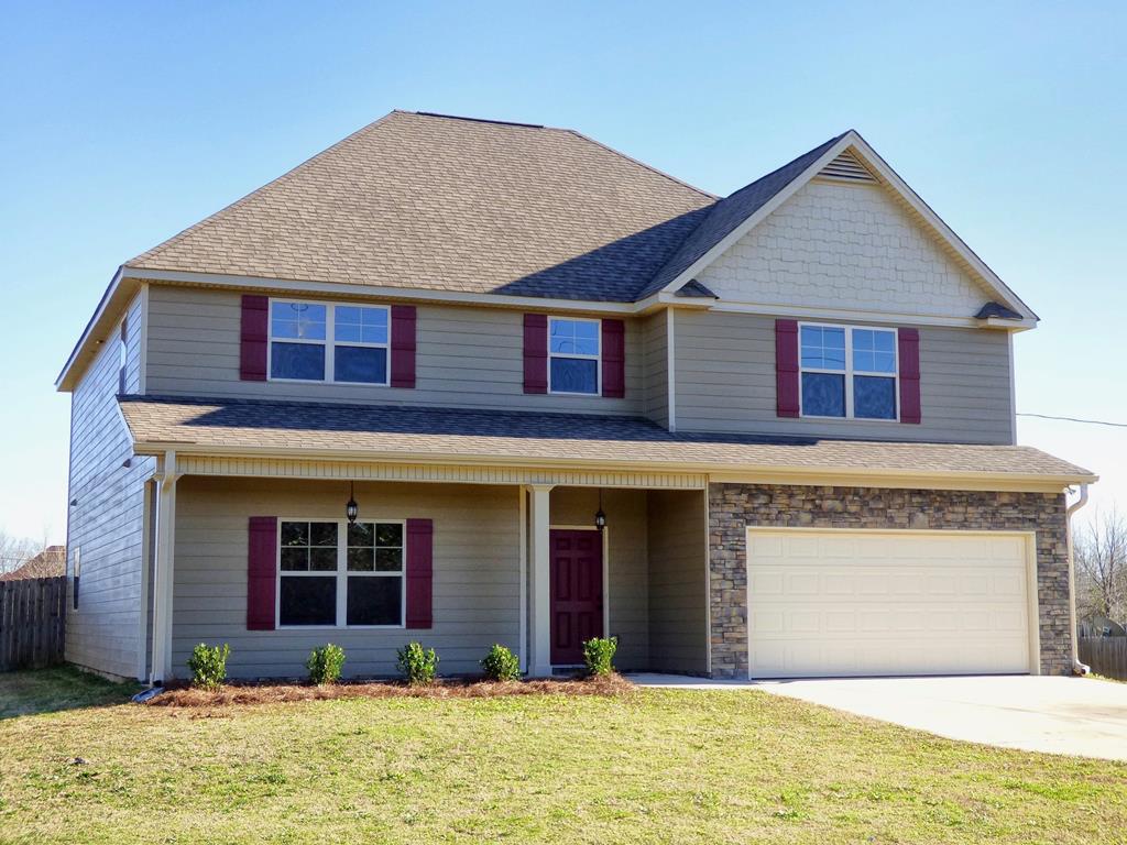 301 Owens Road Fort Mitchell, AL 36856 - Photo 1 of 17 a front view of a house with a yard