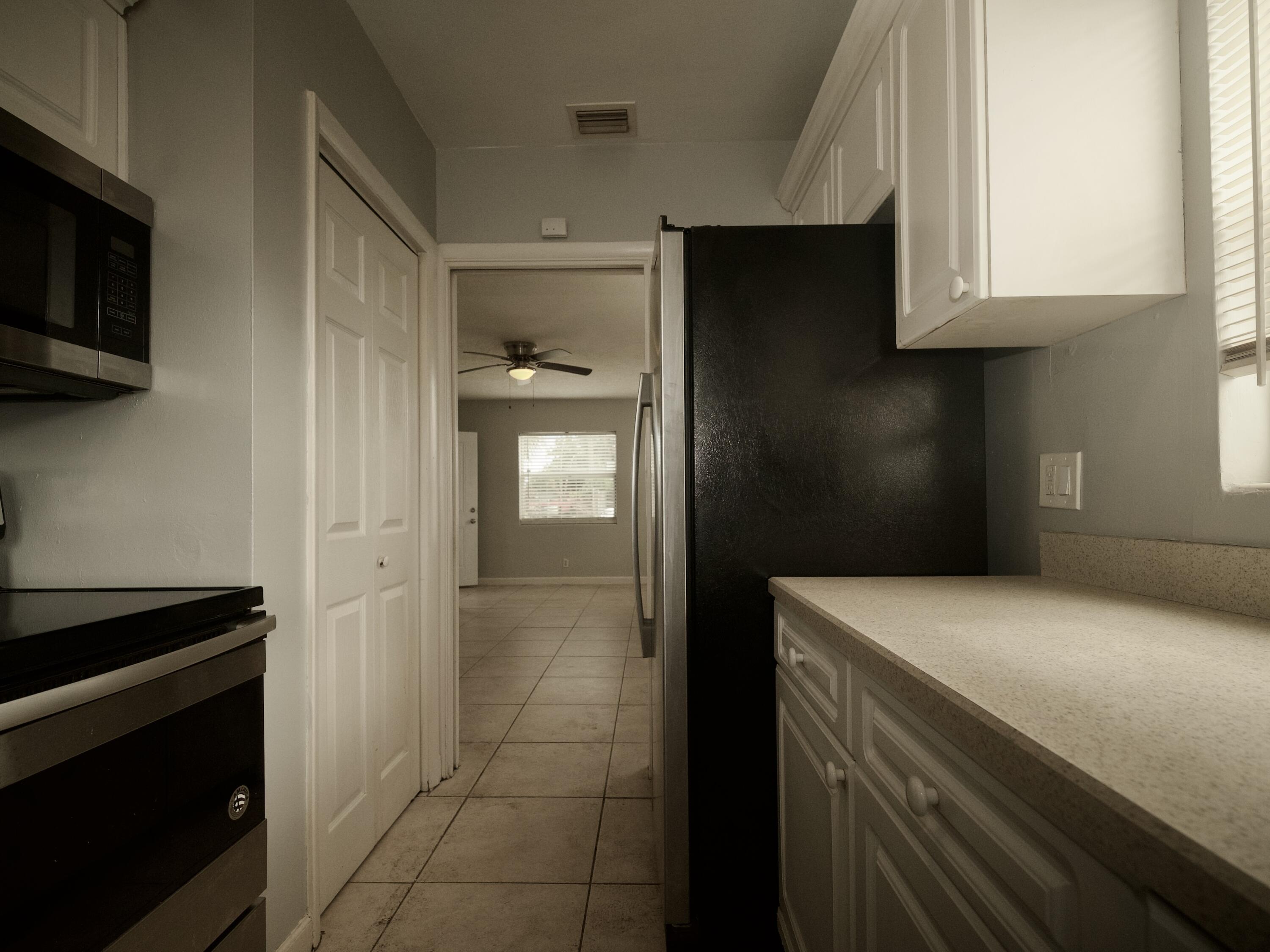158 West 25th Street Riviera Beach, FL 33404 - Photo 5 of 24 43 - 16