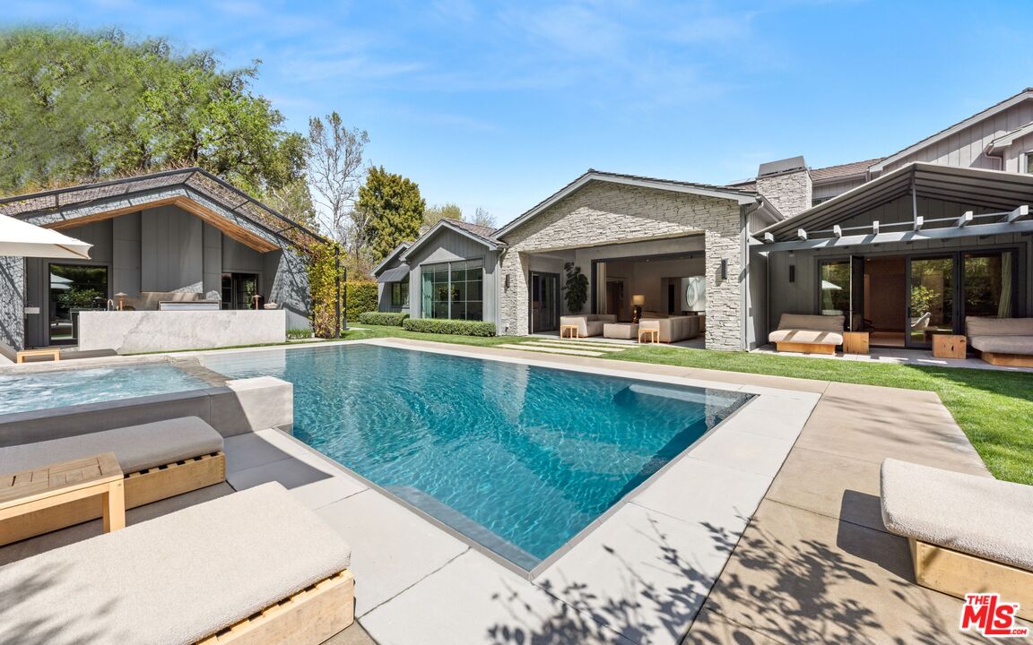 a view of a house with a swimming pool
