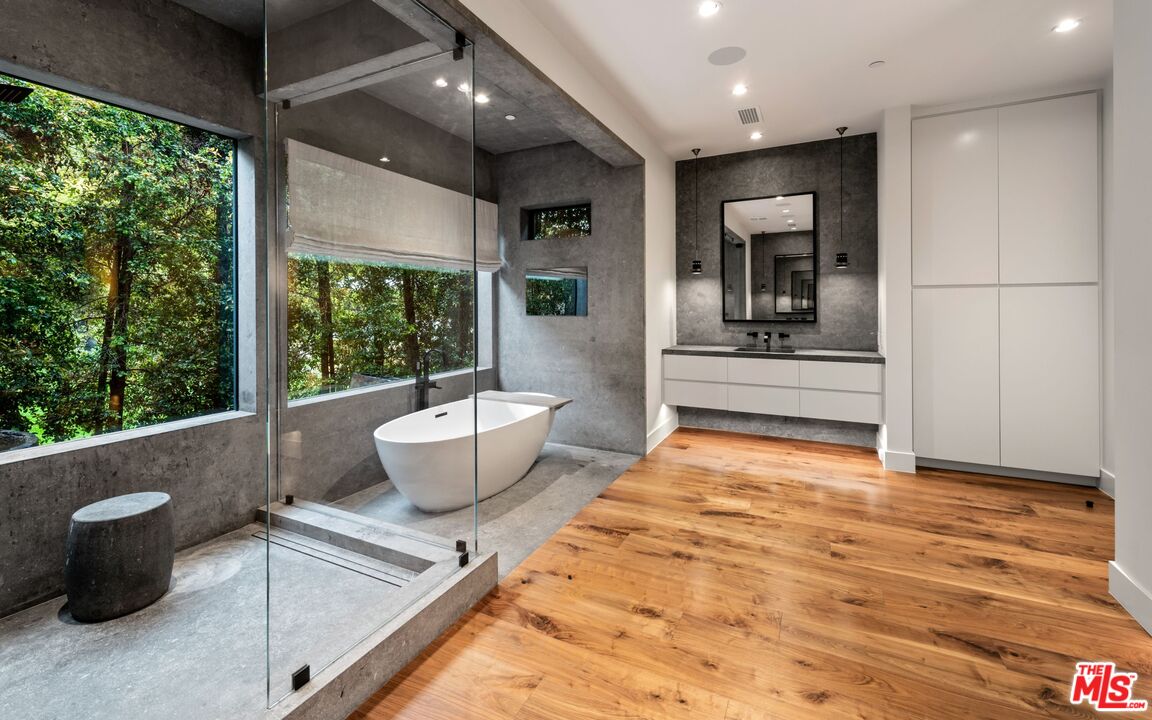 24848 Long Valley Road Hidden Hills, CA 91302 - Photo 13 of 38 a living room with furniture and a large window