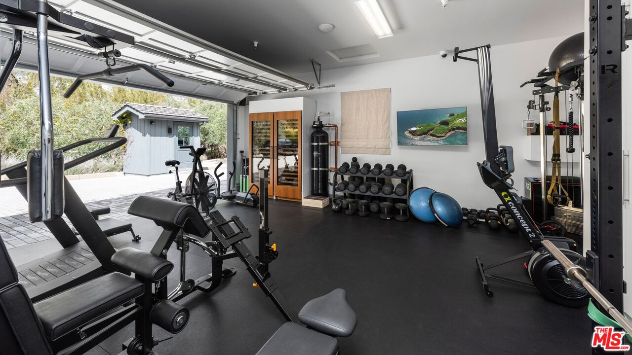 24848 Long Valley Road Hidden Hills, CA 91302 - Photo 28 of 38 a view of a room with gym equipment