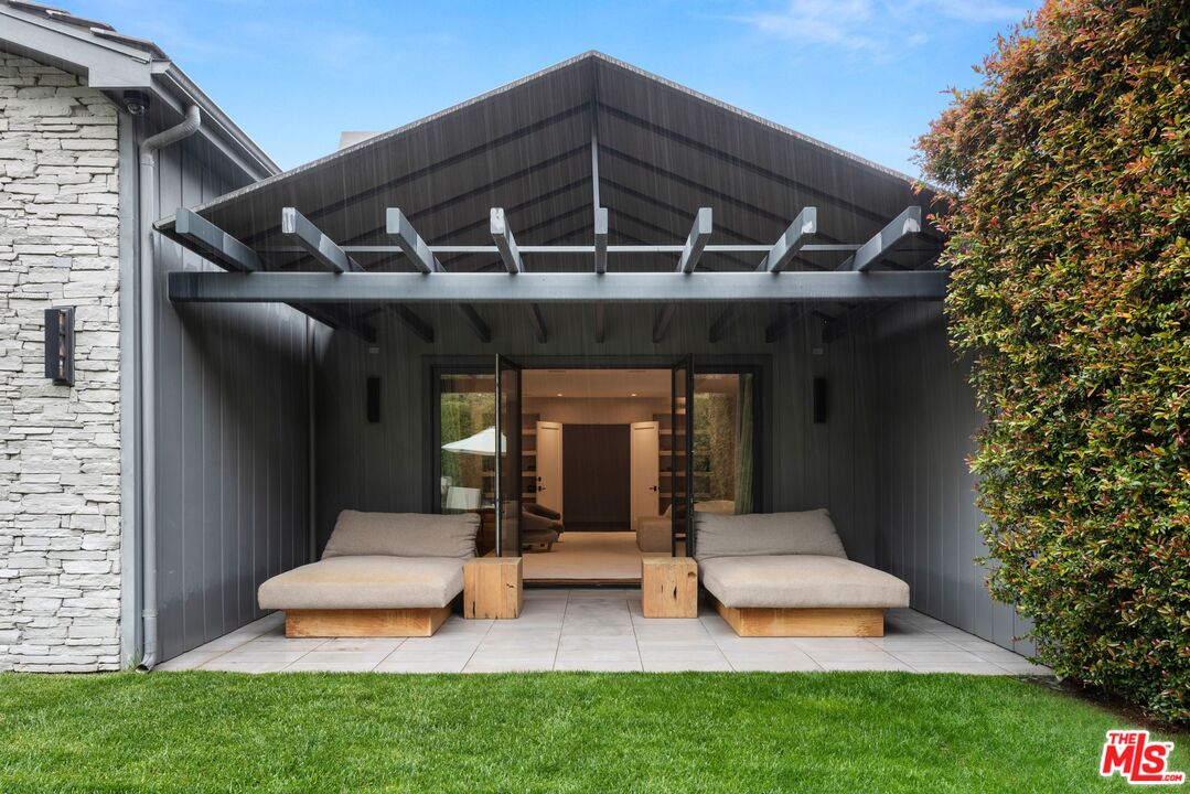 24848 Long Valley Road Hidden Hills, CA 91302 - Photo 34 of 38 a front view of a house with garden