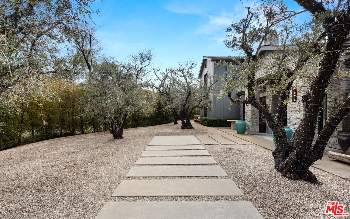 24848 Long Valley Road Hidden Hills, CA 91302 - Photo 38 of 38 a view of pathway with a wrought fence
