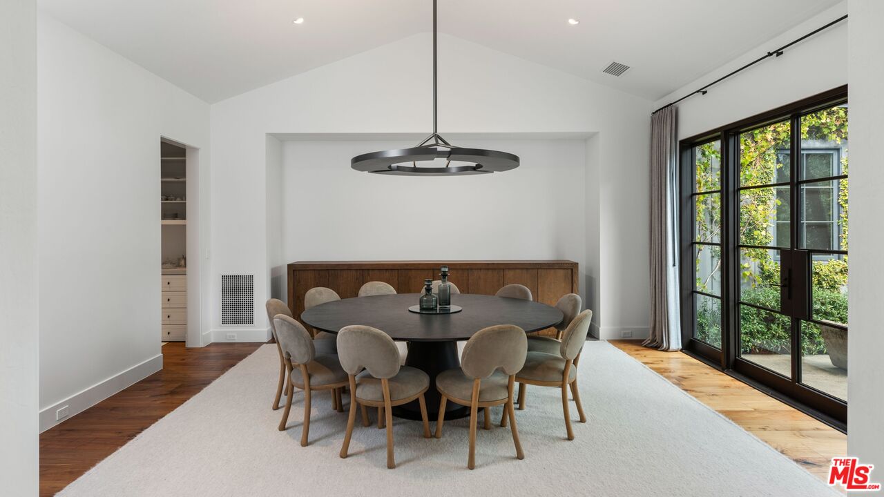 24848 Long Valley Road Hidden Hills, CA 91302 - Photo 9 of 38 a view of a dining room with furniture window and outside view