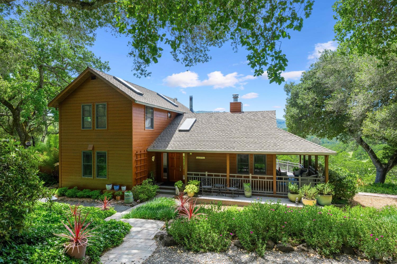 10601 Slattery Road Glen Ellen, CA 95442 - Photo 2 of 45 A paved country lane leads to this private 7.97+/- acre sanctuary minutes to all Sonoma Valley towns.