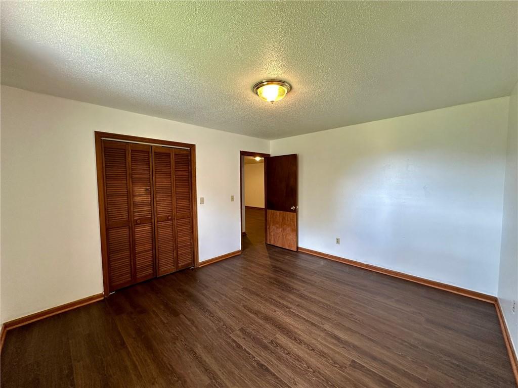 621 Nicklesville Road Northeast Resaca, GA 30735 - Photo 16 of 24 a view of an empty room with wooden floor