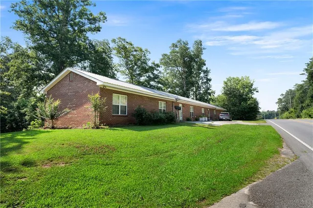 a house view with a garden space
