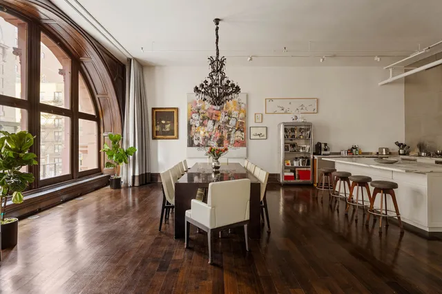 a dining room with furniture window wooden floor
