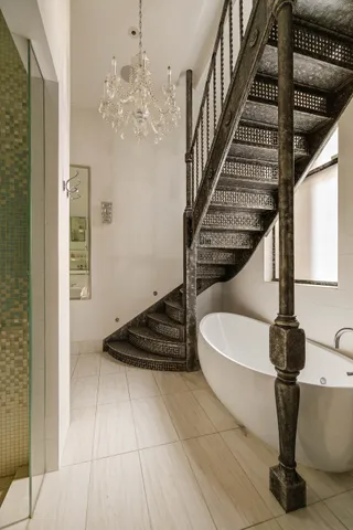 a view of entryway and hall with a front door