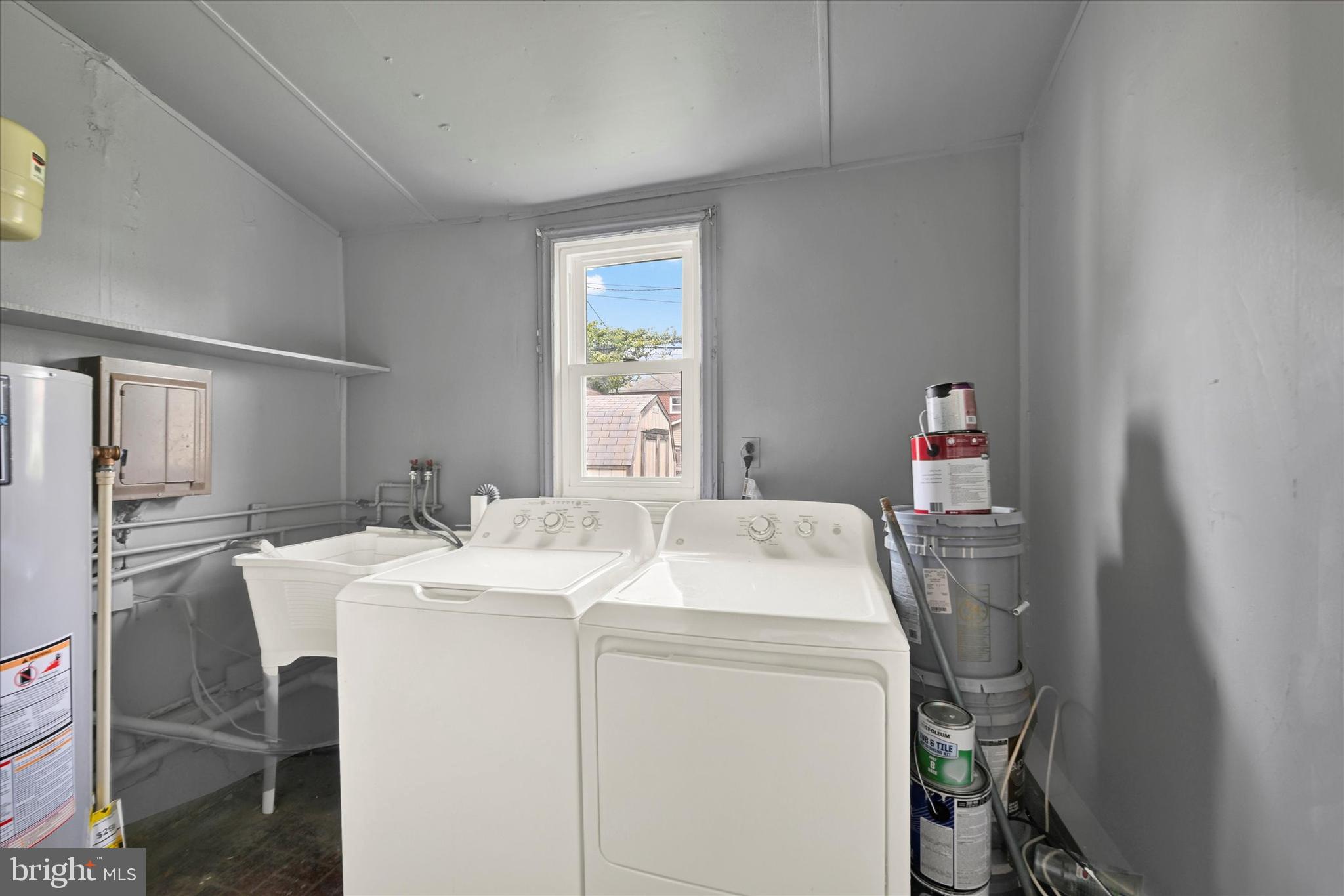 6820 Bessemer Avenue Baltimore, MD 21222 - Photo 14 of 17 a utility room with dryer and washer